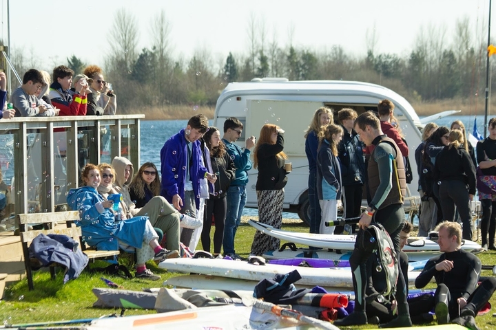 Image of music equipment and a man playing a guitar.