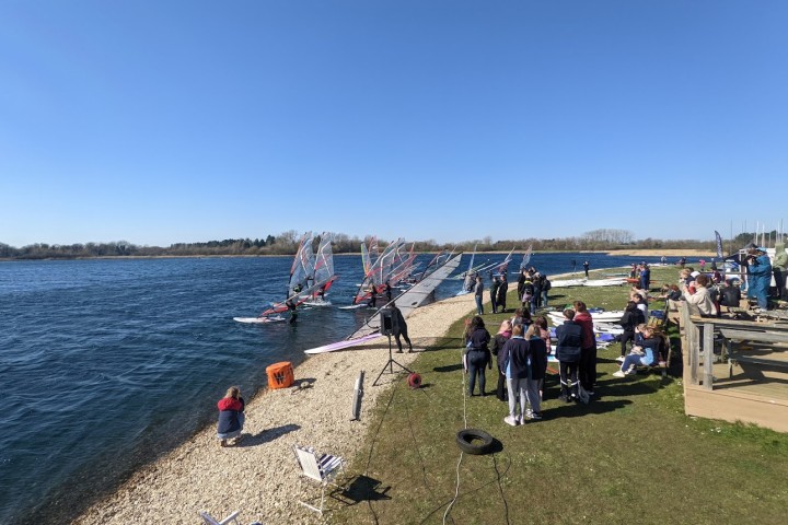 Image of music equipment and a man playing a guitar.